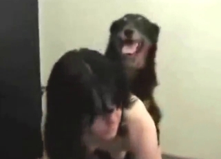 Strange and skinny brunette fucking a dog